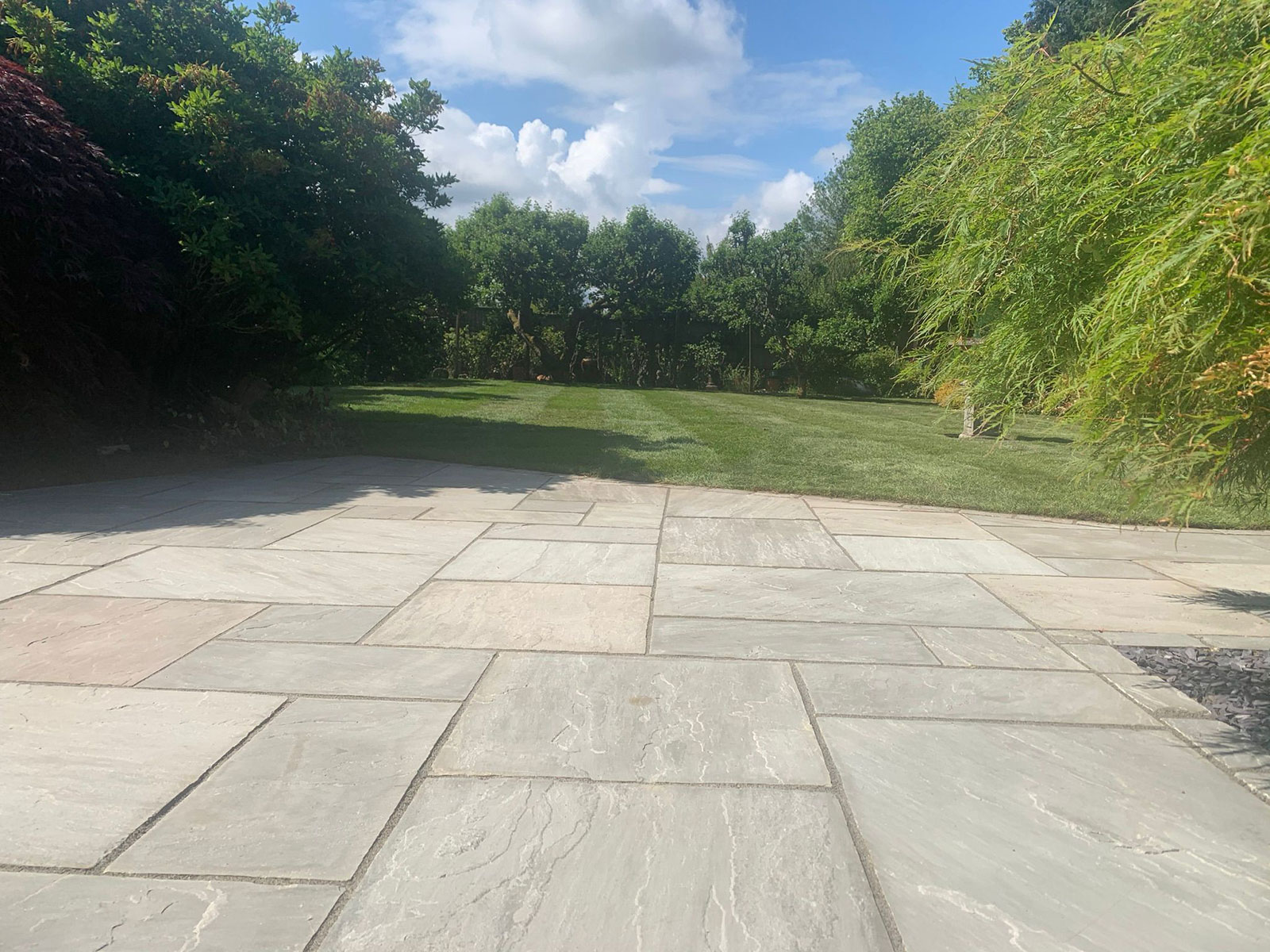 Sandstone patio by Stone Landscapes, Woking, Surrey