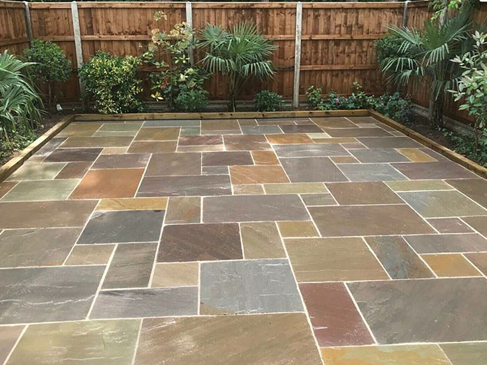 Sandstone patio by Stone Landscapes, Woking, Surrey
