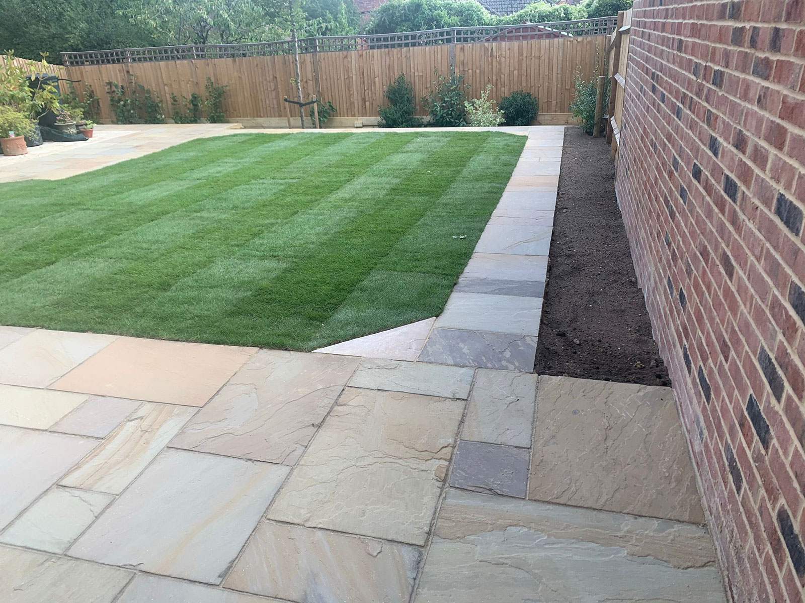 Sandstone patio by Stone Landscapes, Woking, Surrey