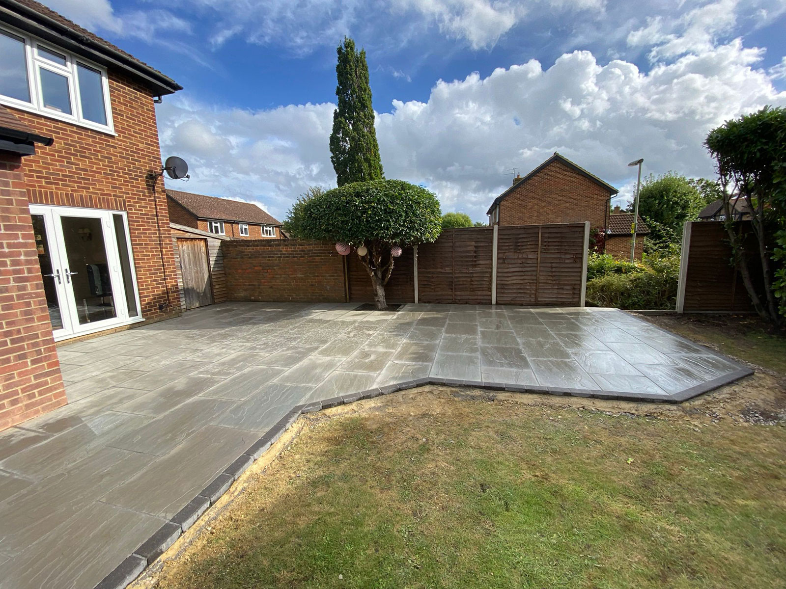 Sandstone patio by Stone Landscapes, Woking, Surrey