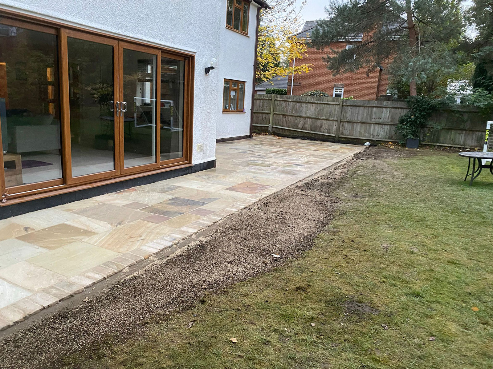 Sandstone patio by Stone Landscapes, Woking, Surrey