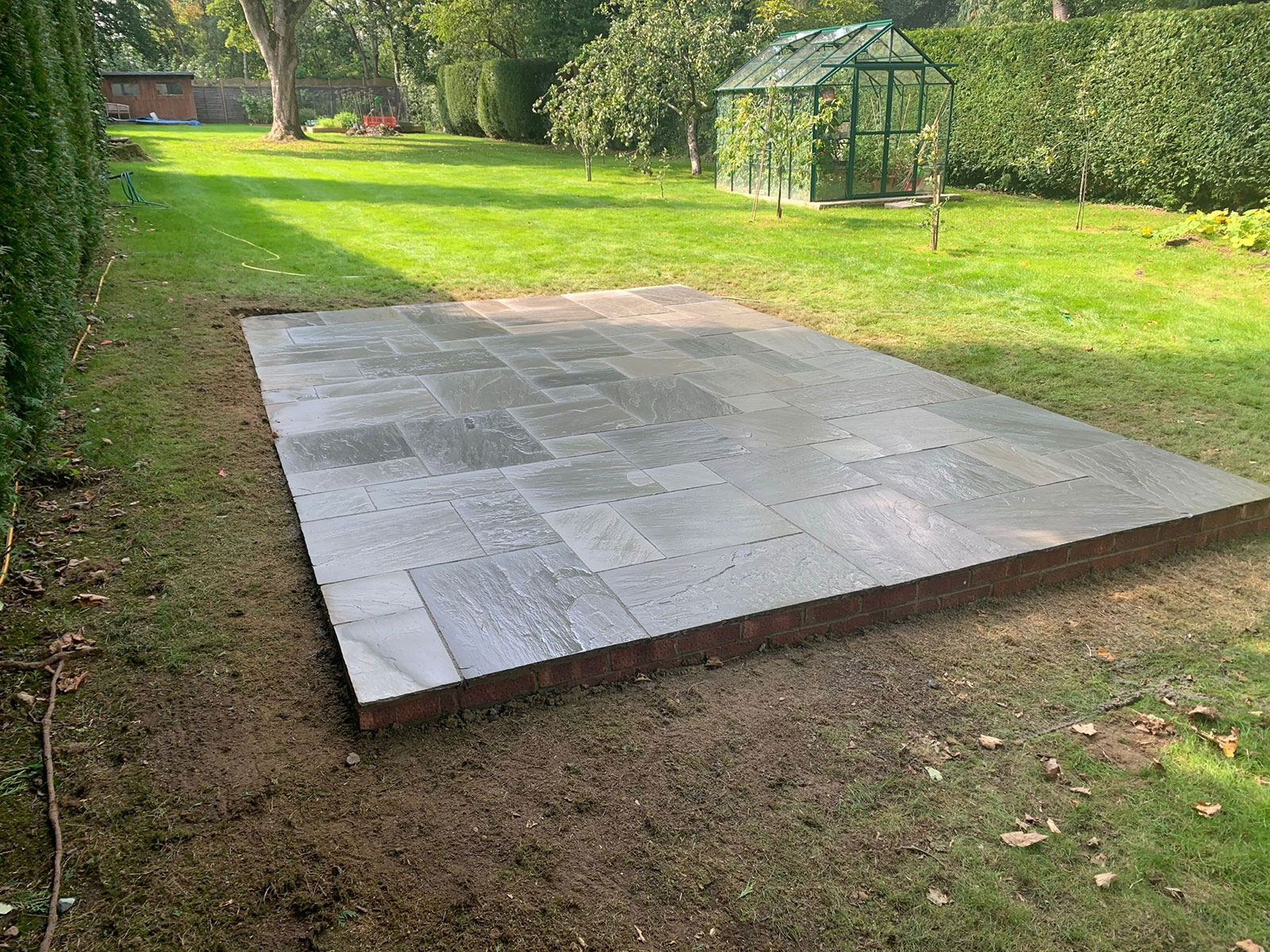 Sandstone patio by Stone Landscapes, Woking, Surrey