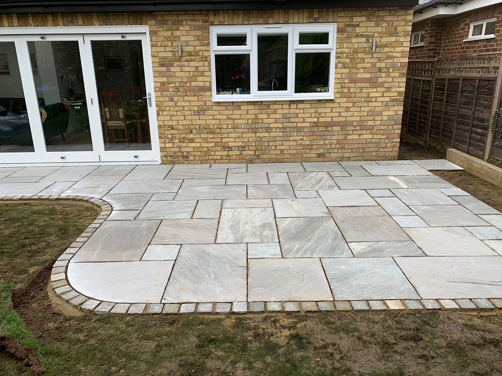 Sandstone patio by Stone Landscapes, Woking, Surrey
