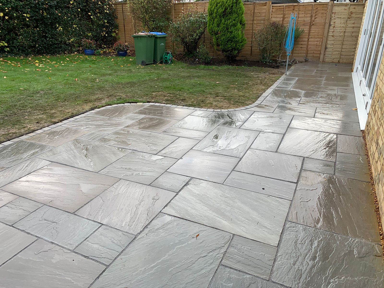 Sandstone patio by Stone Landscapes, Woking, Surrey