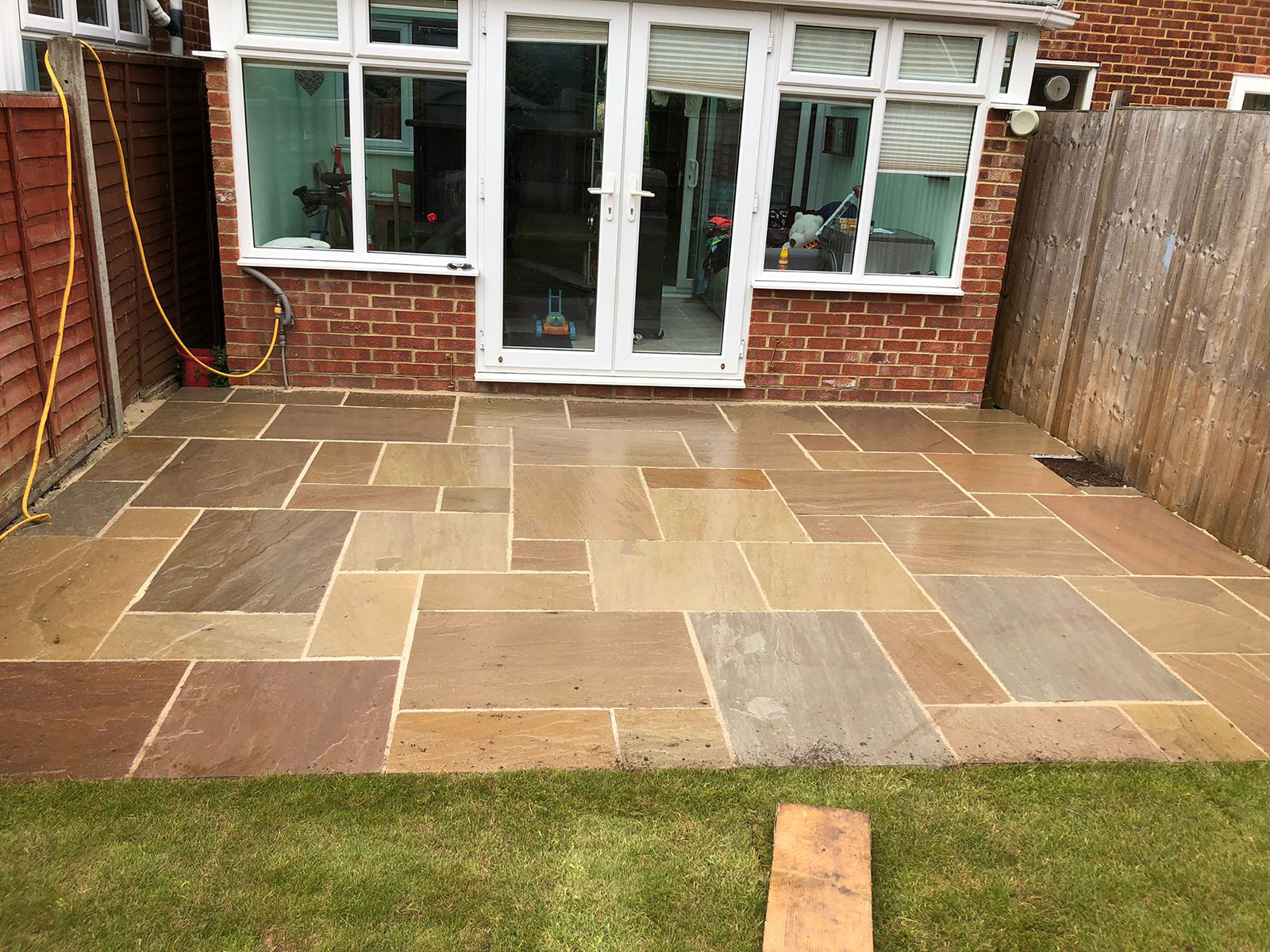 Sandstone patio by Stone Landscapes, Woking, Surrey