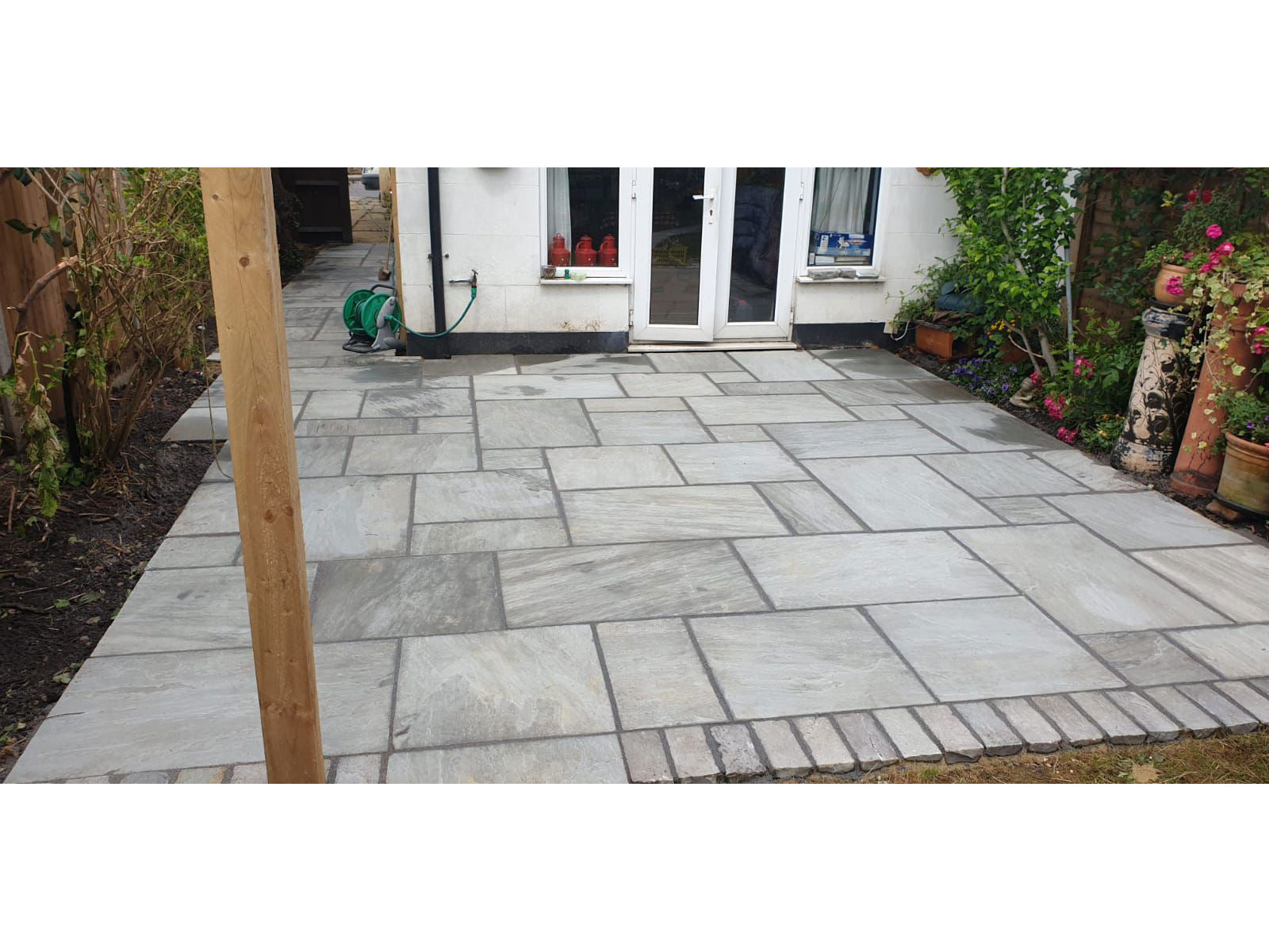 Sandstone patio by Stone Landscapes, Woking, Surrey