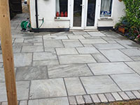 Sandstone patio by Stone Landscapes, Woking, Surrey