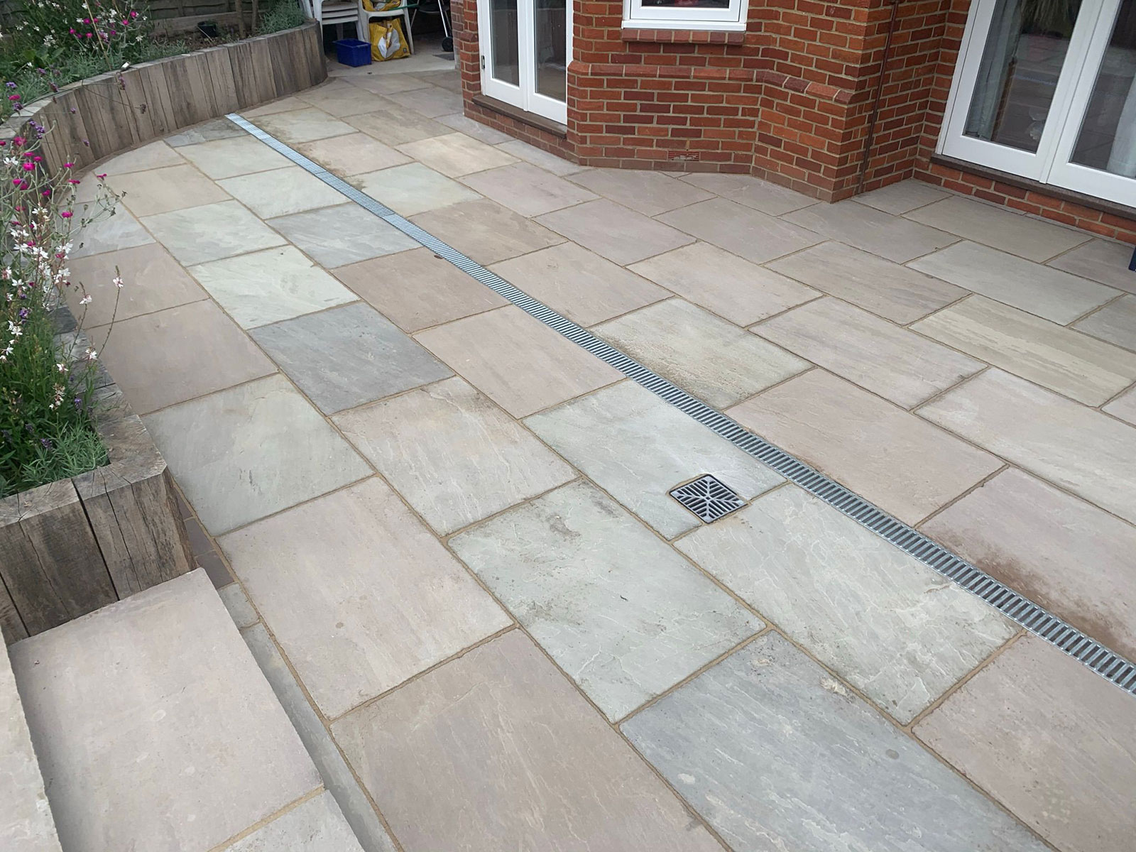 Sandstone patio by Stone Landscapes, Woking, Surrey