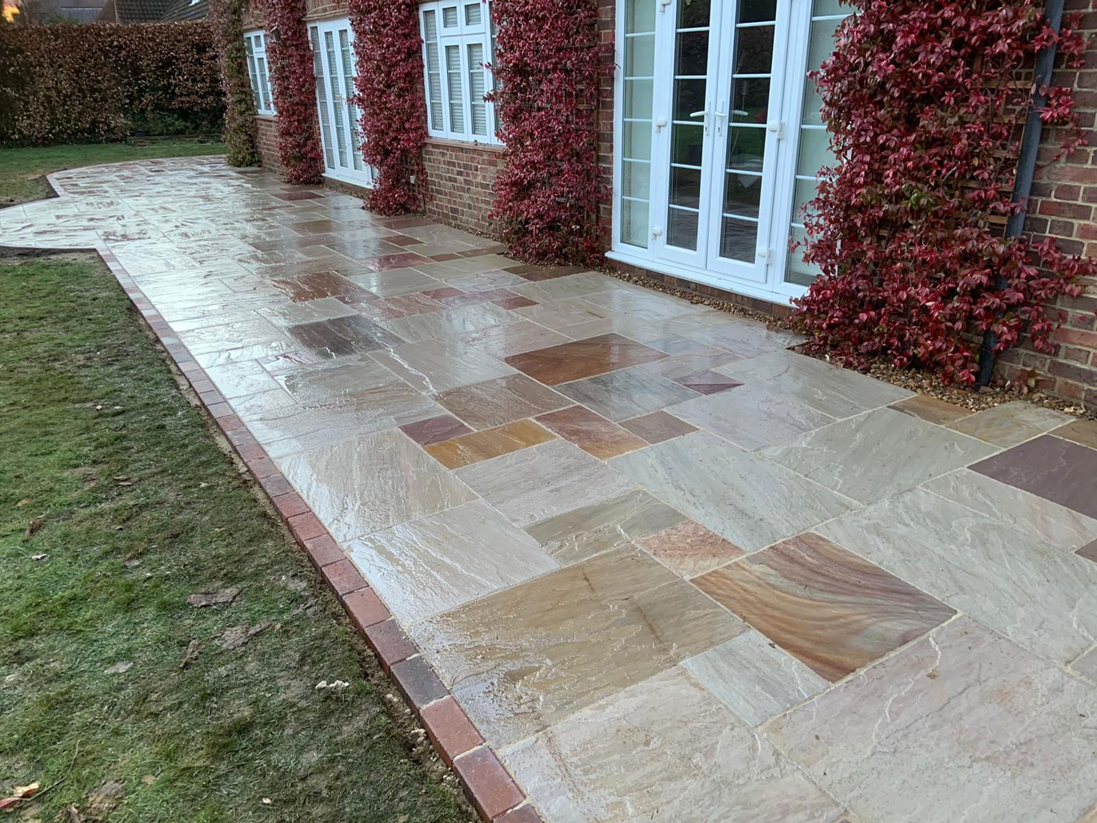 Sandstone patio by Stone Landscapes, Woking, Surrey