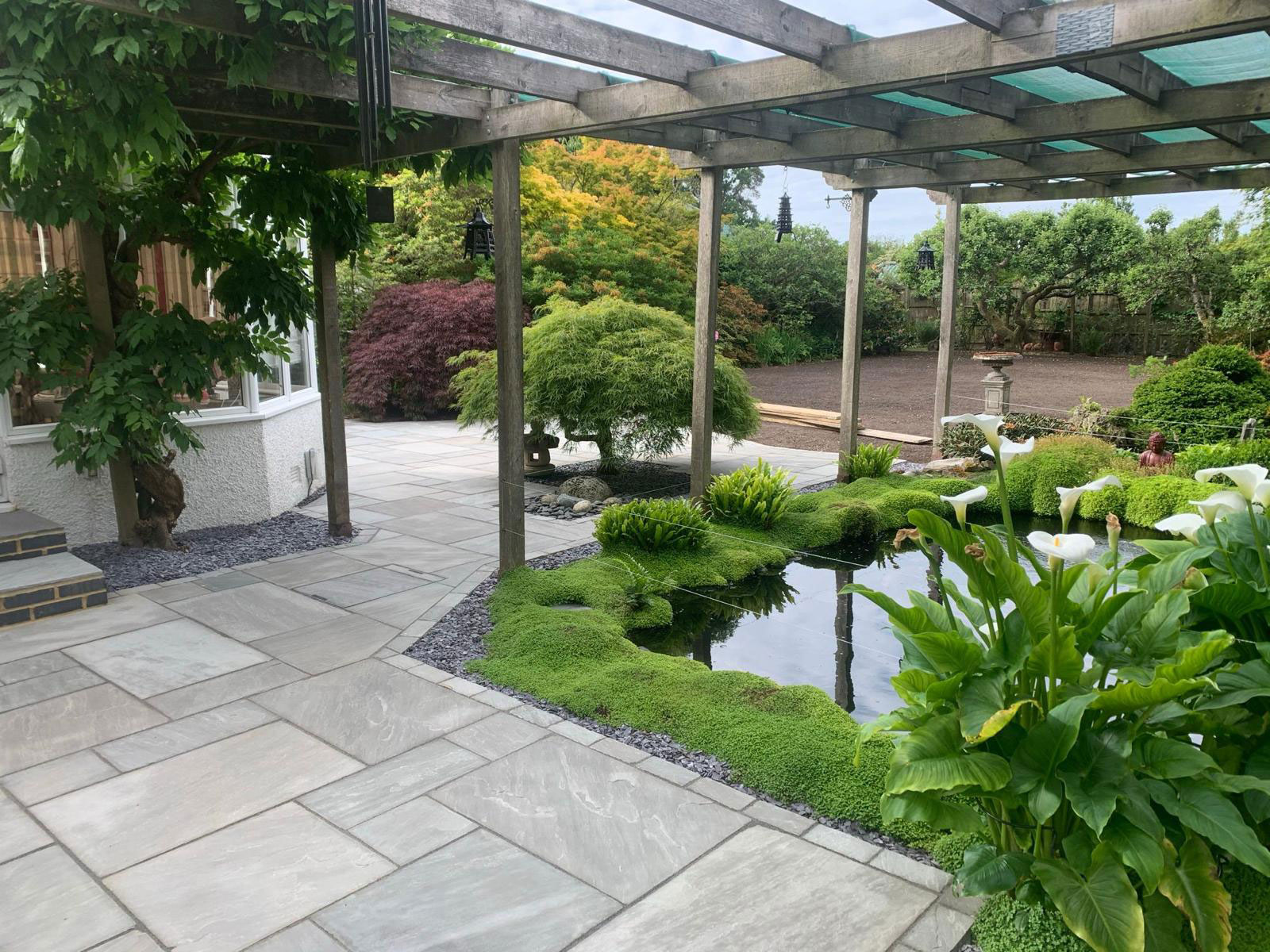 Sandstone patio by Stone Landscapes, Woking, Surrey