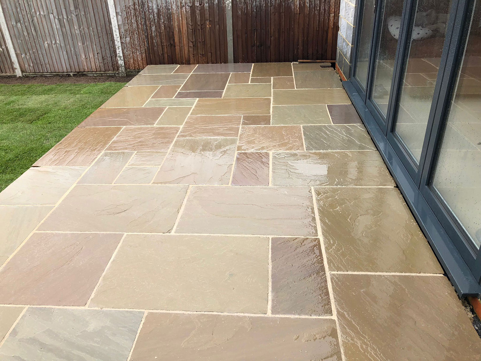 Sandstone patio by Stone Landscapes, Woking, Surrey