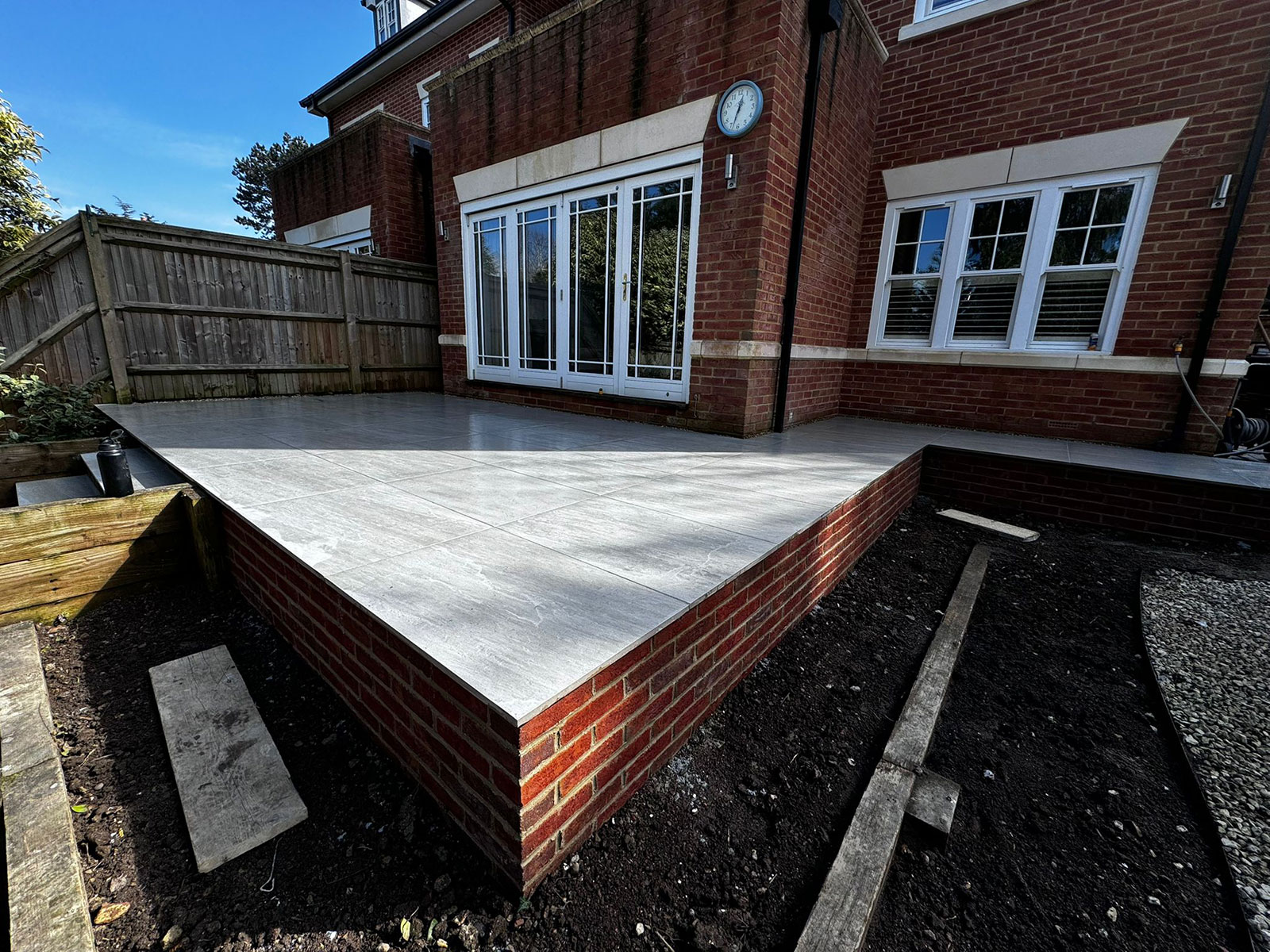 Porcelain patio by Stone Landscapes, Woking, Surrey