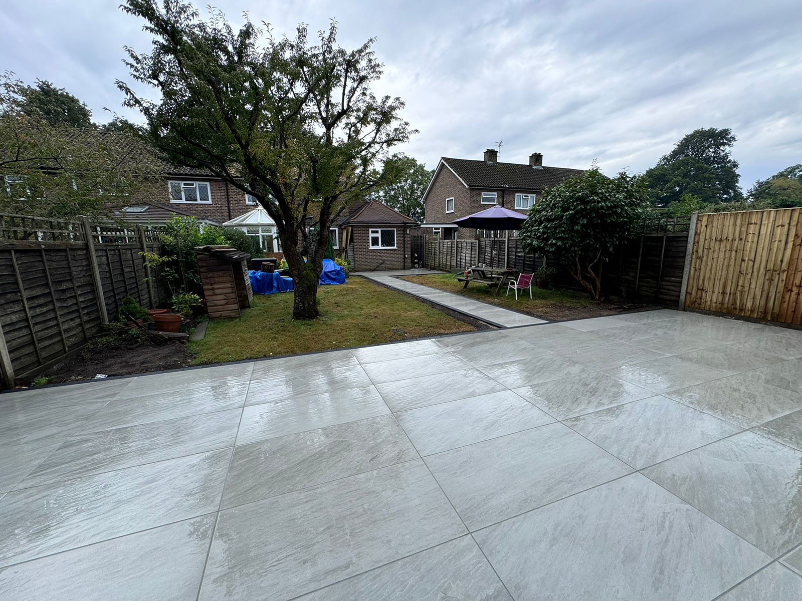 Porcelain patio by Stone Landscapes, Woking, Surrey