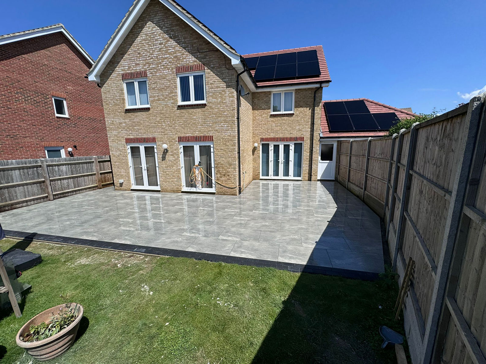 Porcelain patio by Stone Landscapes, Woking, Surrey