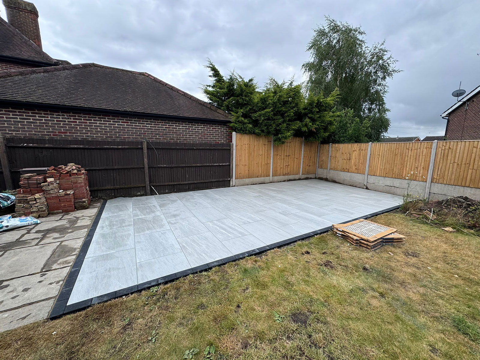 Porcelain patio by Stone Landscapes, Woking, Surrey