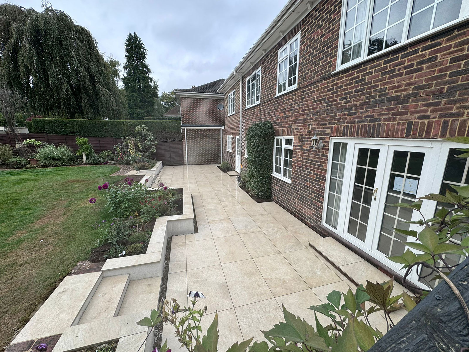 Porcelain patio by Stone Landscapes, Woking, Surrey