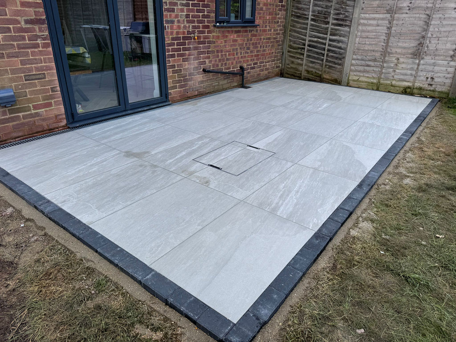 Porcelain patio by Stone Landscapes, Woking, Surrey