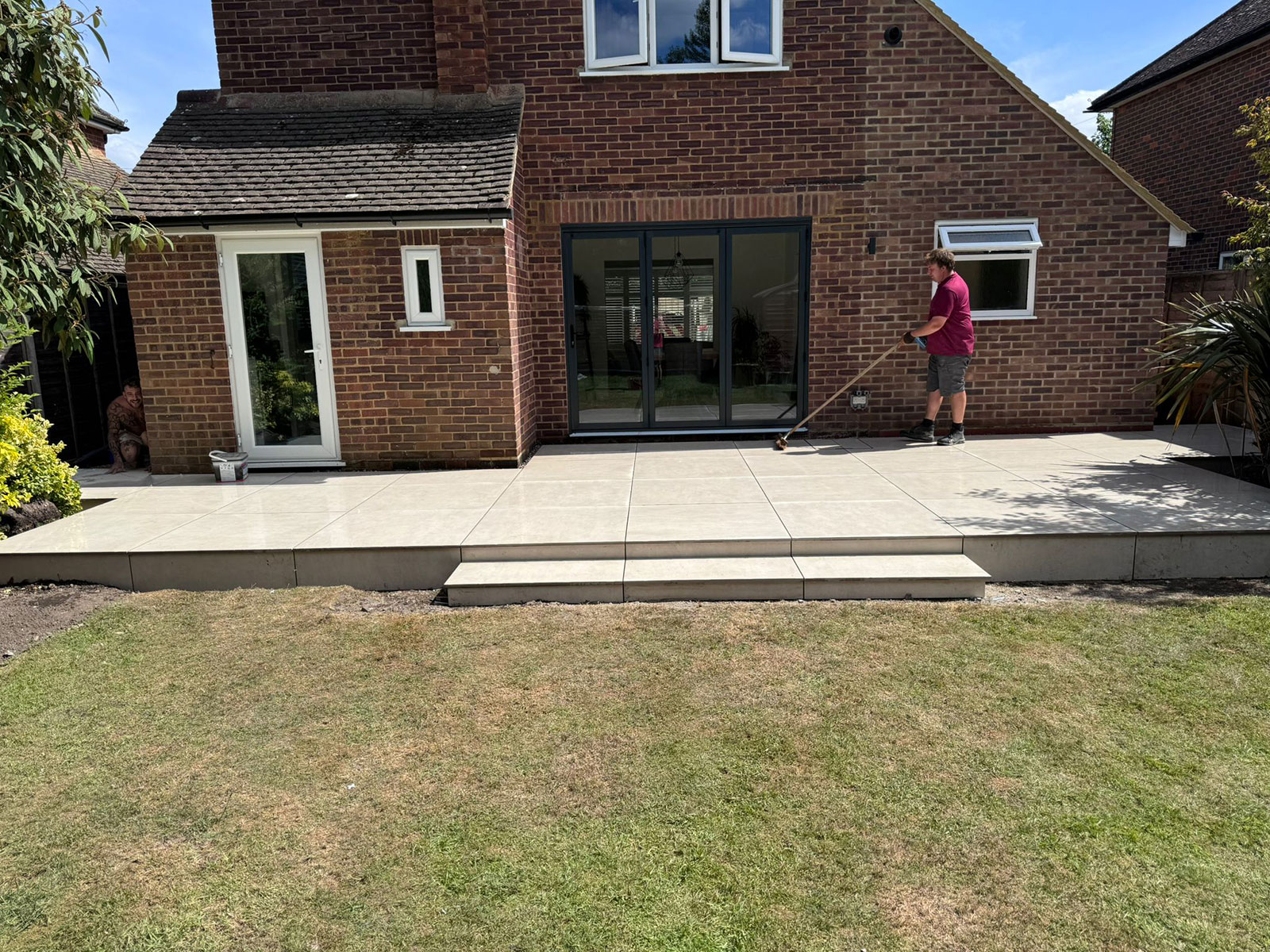 Porcelain patio by Stone Landscapes, Woking, Surrey