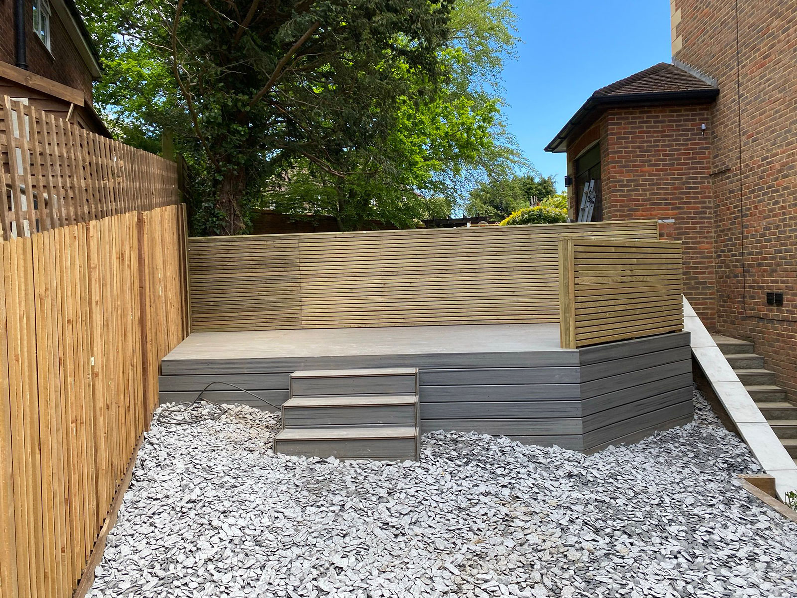 Porcelain patio by Stone Landscapes, Woking, Surrey