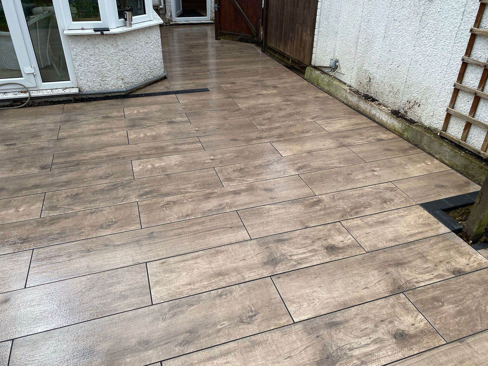 Porcelain patio by Stone Landscapes, Woking, Surrey
