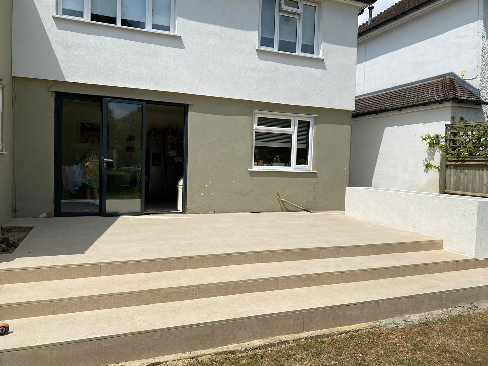 Porcelain patio by Stone Landscapes, Woking, Surrey