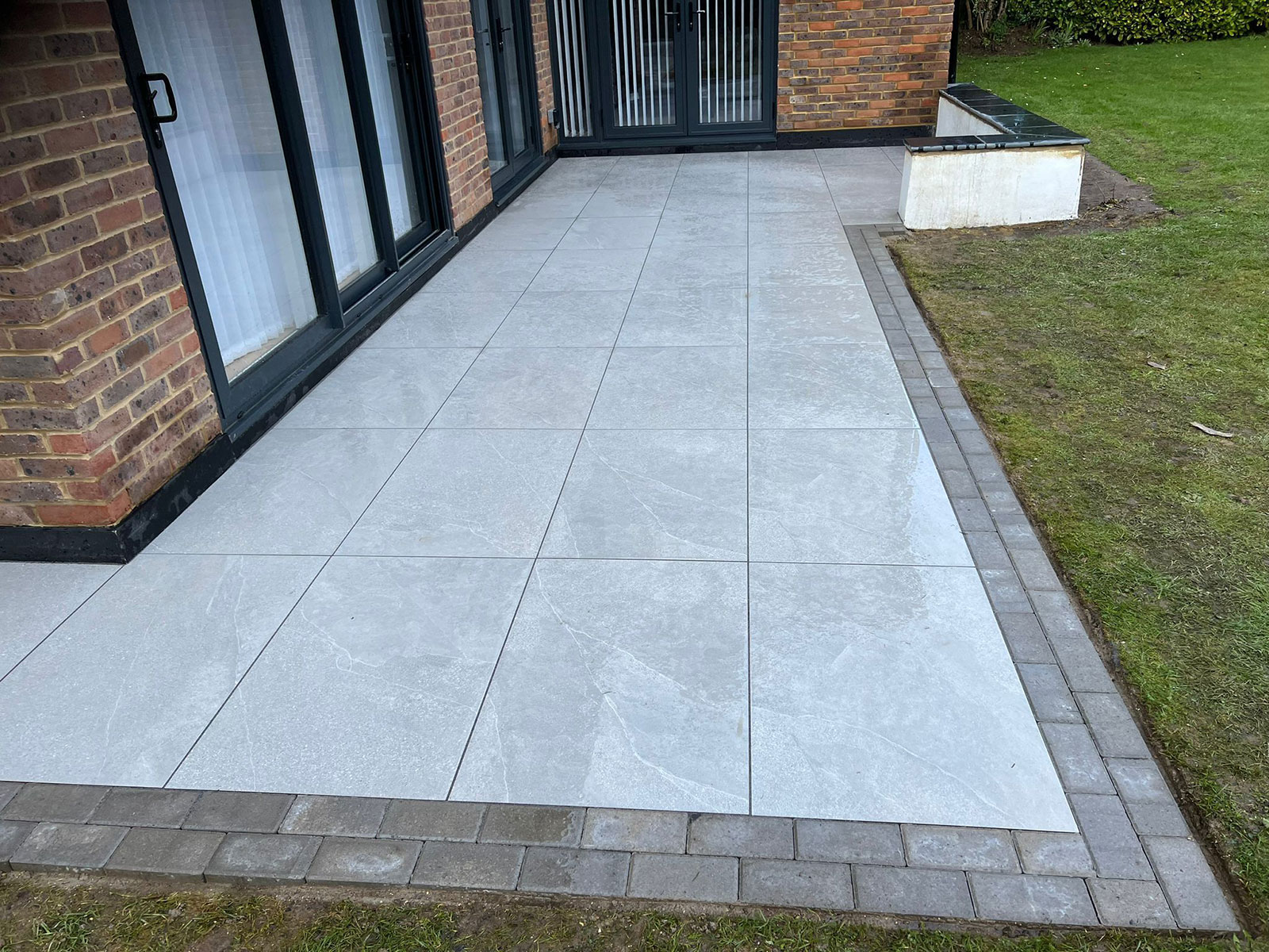 Porcelain patio by Stone Landscapes, Woking, Surrey