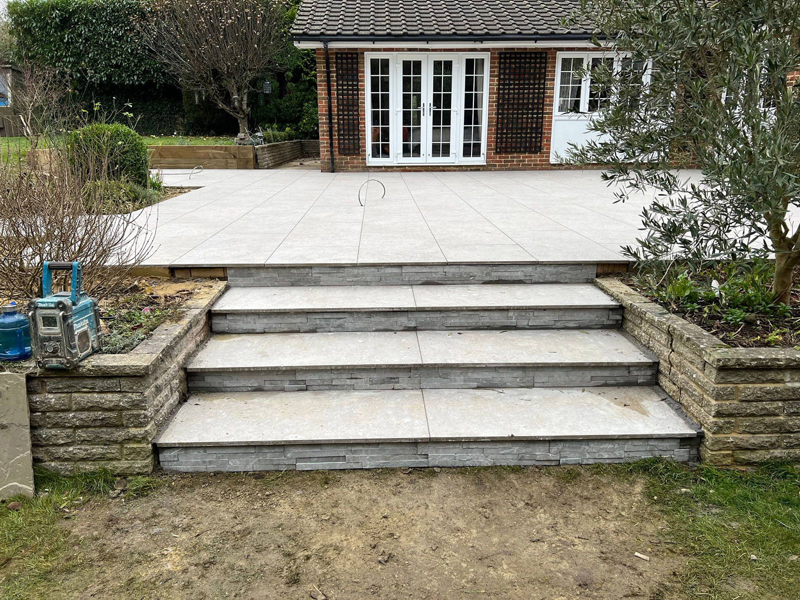 Porcelain patio by Stone Landscapes, Woking, Surrey