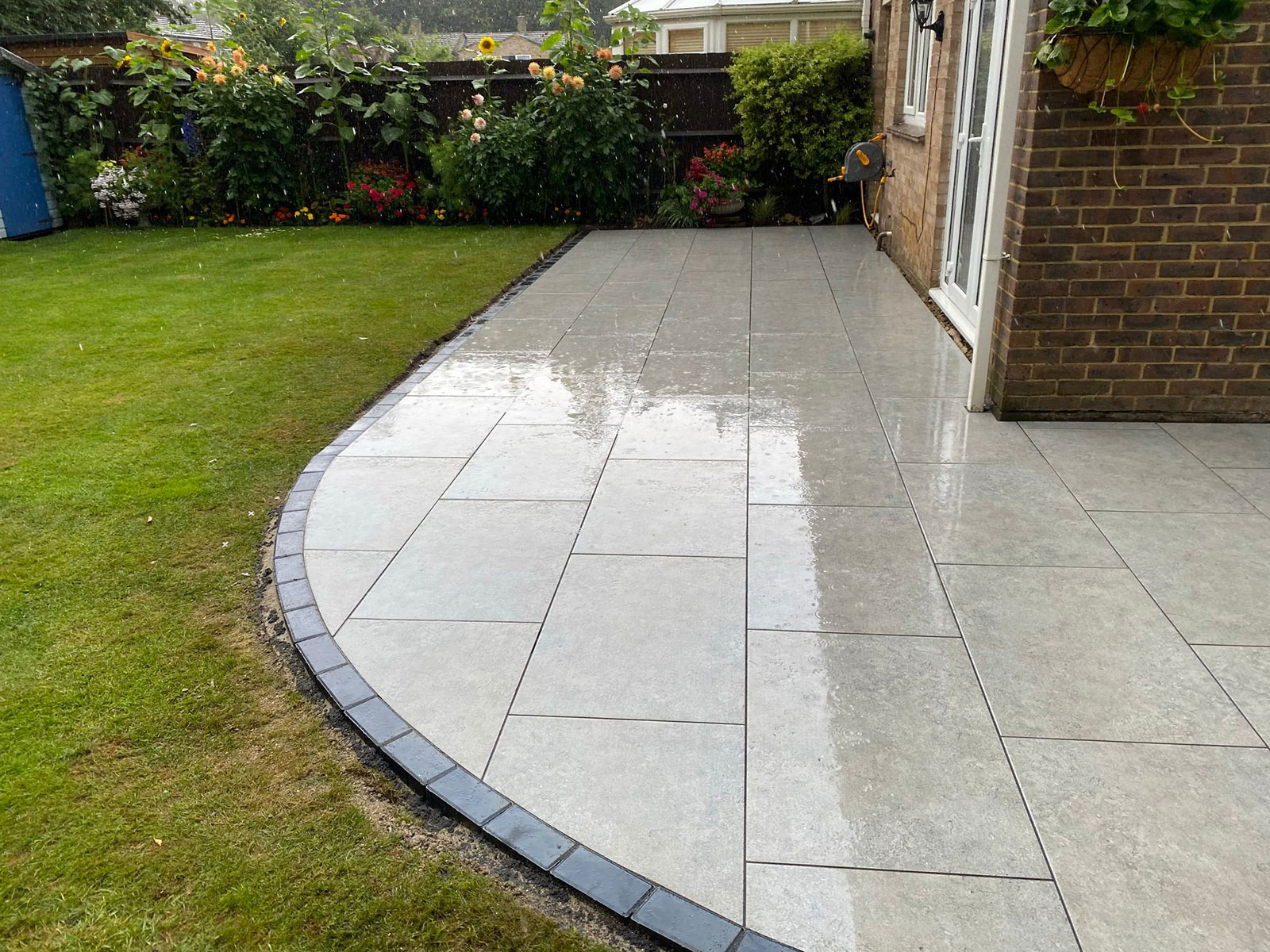 Porcelain patio by Stone Landscapes, Woking, Surrey
