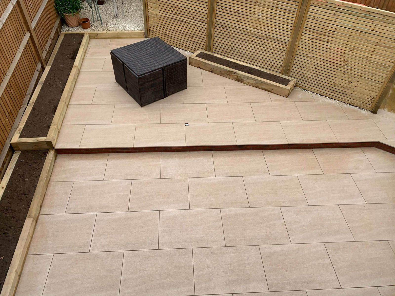 Porcelain patio by Stone Landscapes, Woking, Surrey