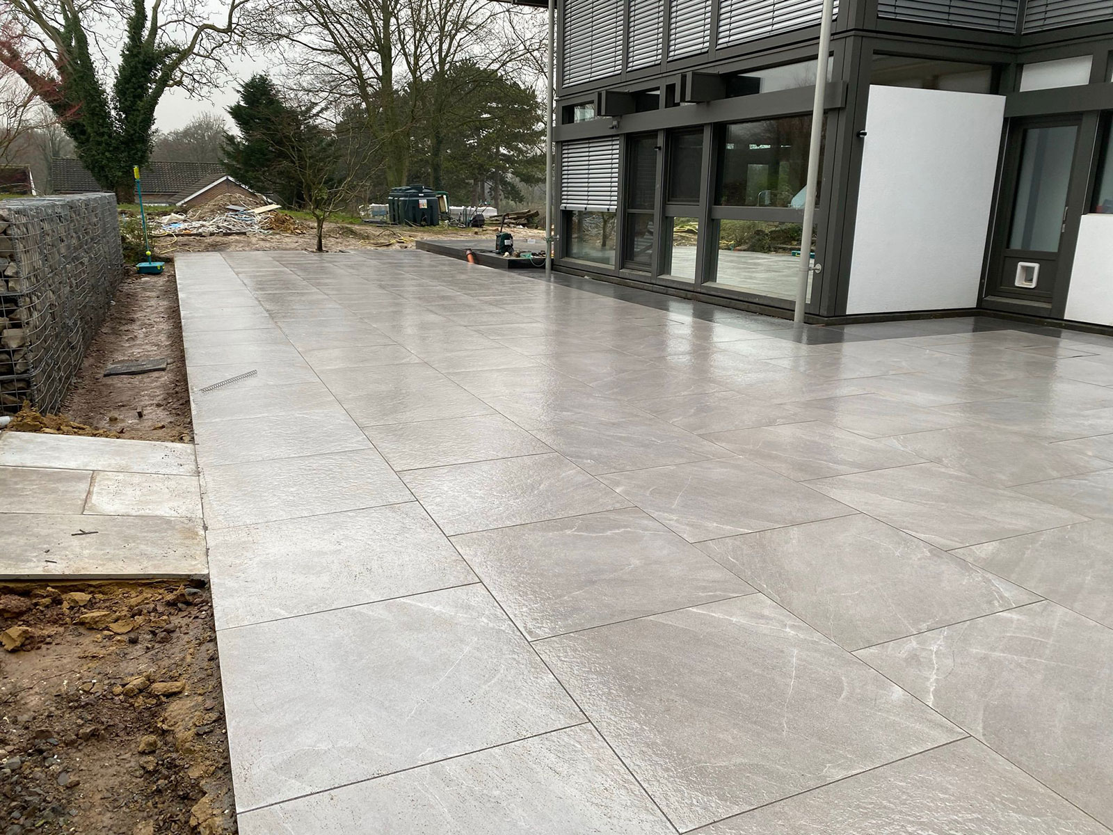 Porcelain patio by Stone Landscapes, Woking, Surrey
