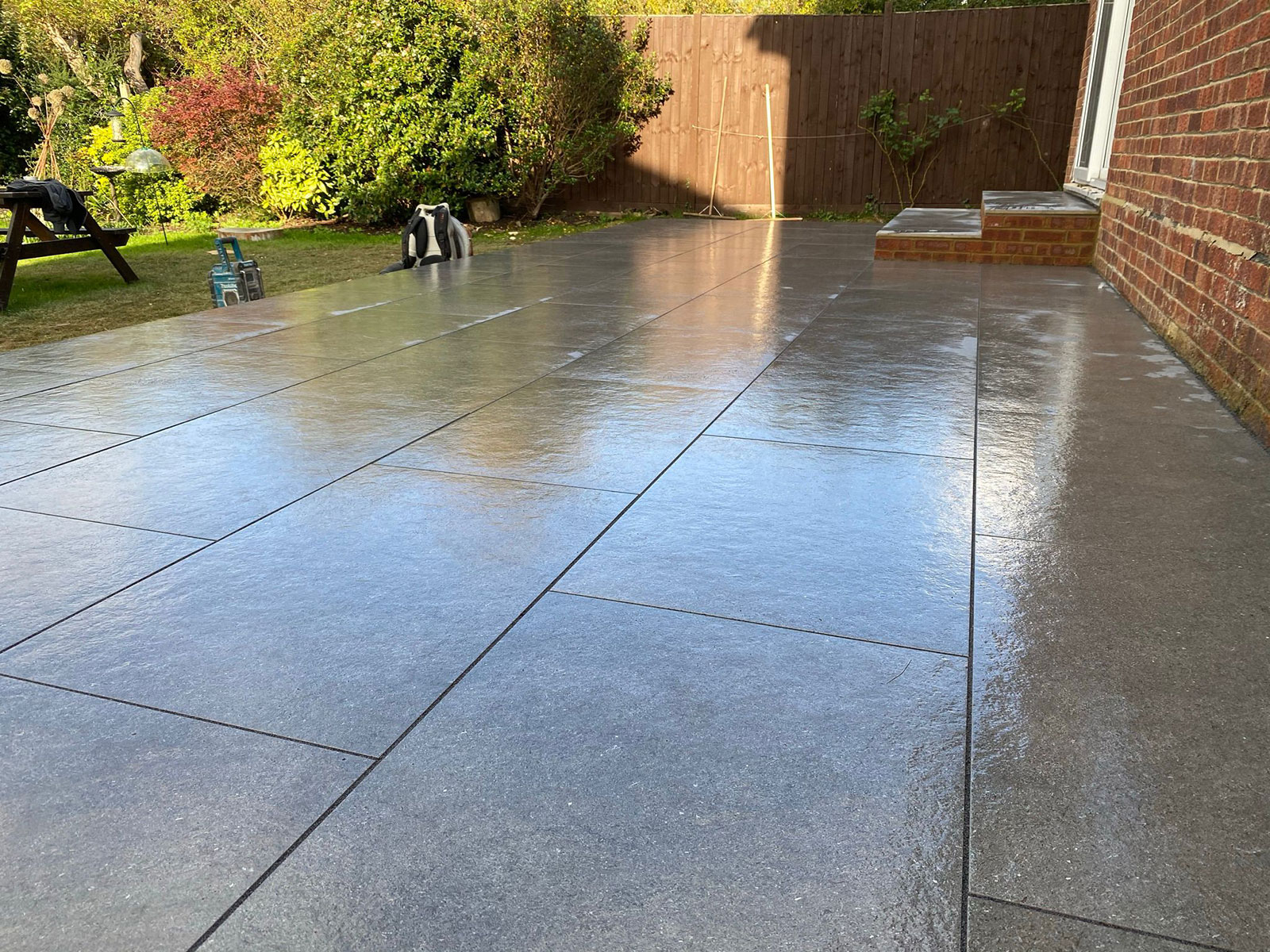 Porcelain patio by Stone Landscapes, Woking, Surrey
